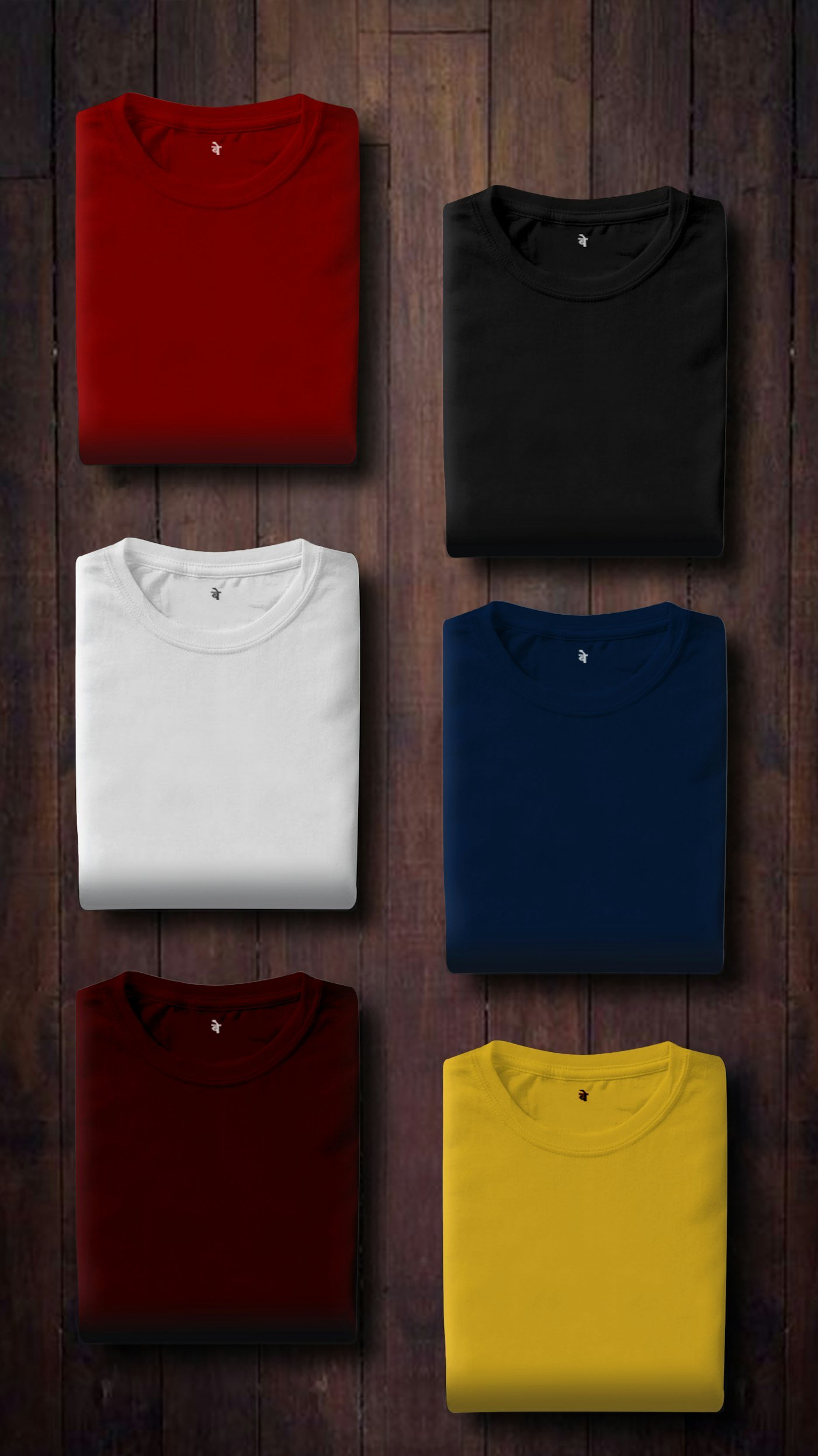 Folded t-shirts in several colors.